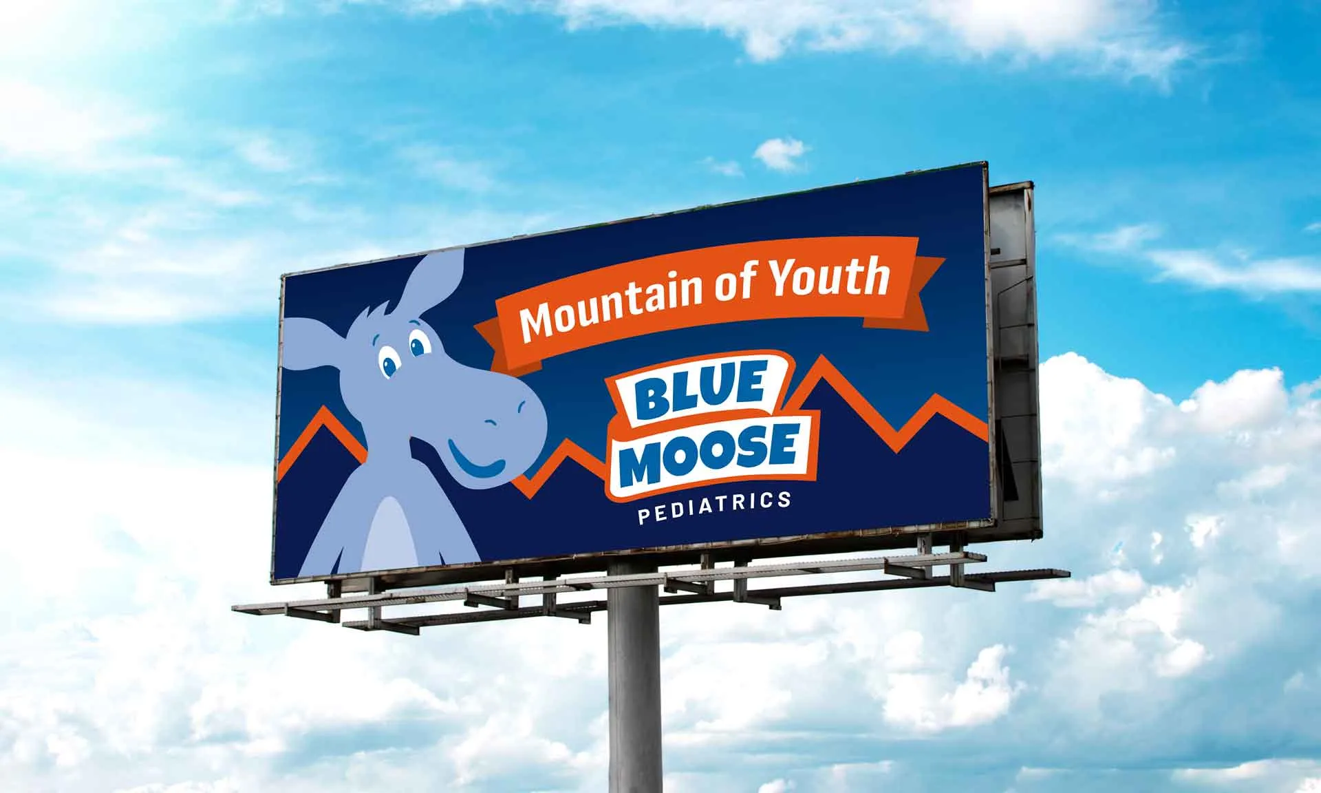 Billboard on cloudy blue sky for Blue Moose Pediatrics 